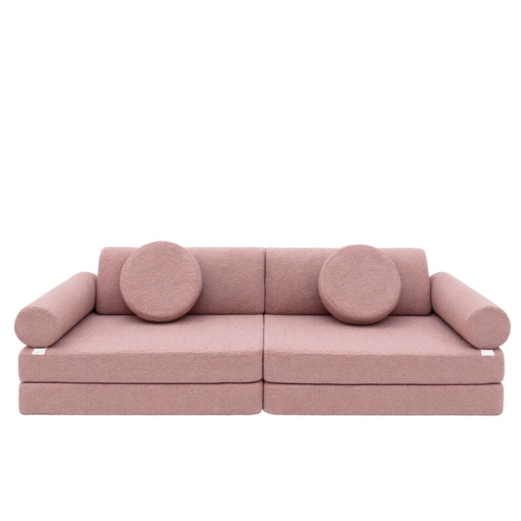Dusty pink play sofa with circular cushions for kids